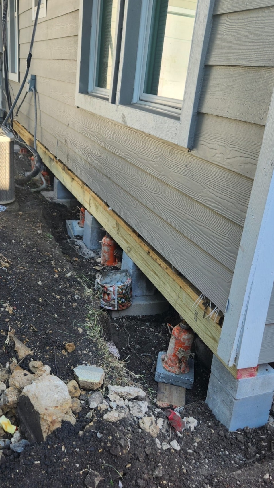 Foundation leveling work in progress on a residential property